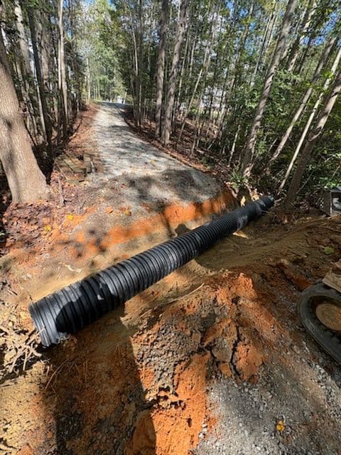 Gallery photos for New Kent Driveway Rehabilitation and Water Flow Solution: Image #2